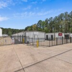 fenced perimeter of Storage Sense on Sartor Street in Leesville, LA