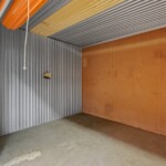 open indoor storage unit at Storage Sense on Wheeler Road in Martinez, GA