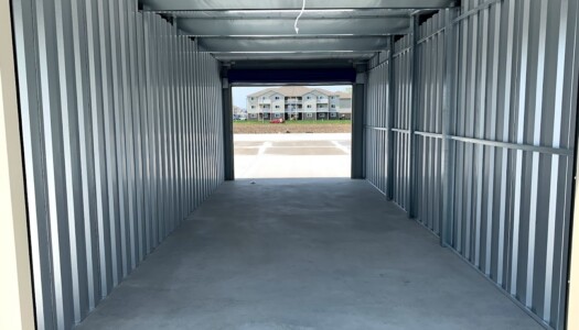 Inside an extra large drive-up storage unit for RVs, boats, cars, and vehicles