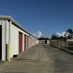 Drive-up storage units at a gated storage facility