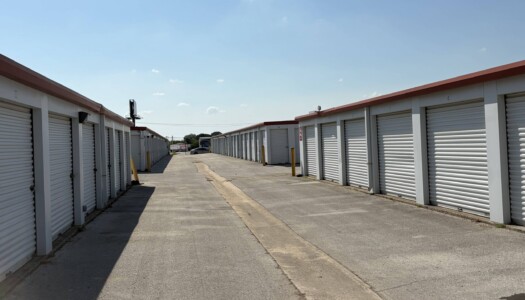 Wide aisle of drive-up storage units