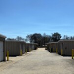 Aisle of outdoor drive-up storage units