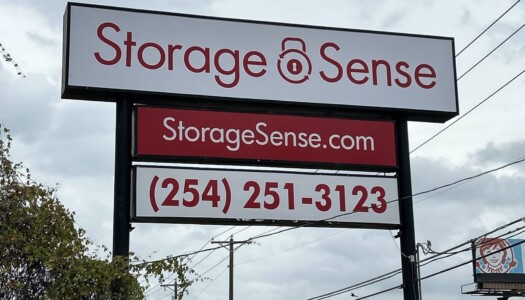 Large signage with Storage Sense logo and Storage Sense - Killeen's phone number 254-251-2123