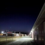 Lit Nightime Photo of Storage Sense - Enon