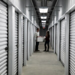 People moving in to their climate-controlled storage unit