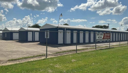Rows of drive up blue metal storage units with white doors
