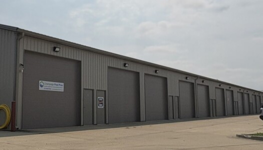 Drive- up storage units with brown doors