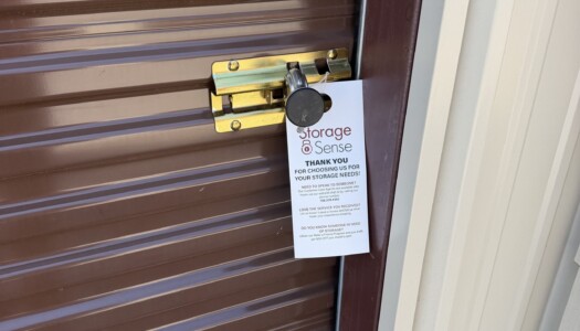 Lock on brown metal storage unit door