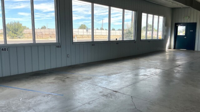Large windows looking outside of temperature-controlled storage units