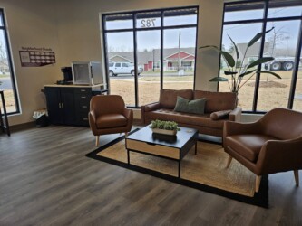 Lounge area with coffee station, microwave, and luxury seating