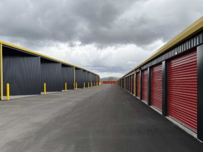 Wide aisle of drive-up storage units and XXL drive-up storage units in Emmett ID
