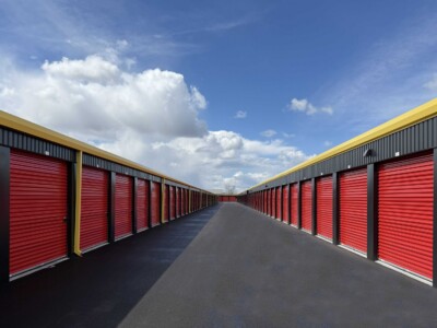 Wide aisle of drive-up storage units in Emmett ID