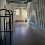 Entry way with moving dollies and keypad security