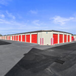 aisles of drive-up storage units at Storage Sense on Feagin Mill Road in Warner Robins, GA
