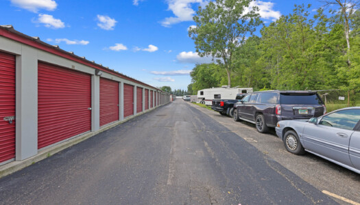 drive-up storage units and vehicle parking at Storage Sense in Flint MI