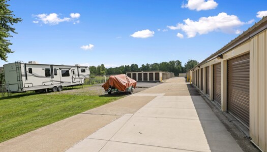 drive-up storage units and vehicle parking at Storage Sense in Holly MI
