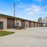 large drive-up storage units and vehicle parking at Storage Sense on Hwy 17 in Clarkesville, GA