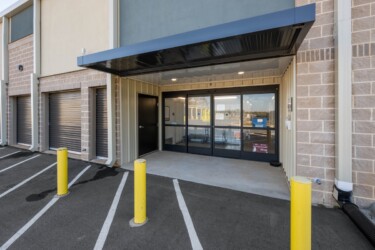 outside the office with keypad entrance to Storage Sense in Troutman, NC