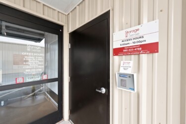 outside the office with keypad entrance to Storage Sense in Troutman, NC