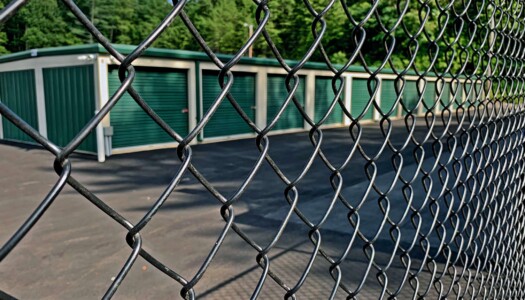 Looking at drive-up storage units through secure gate