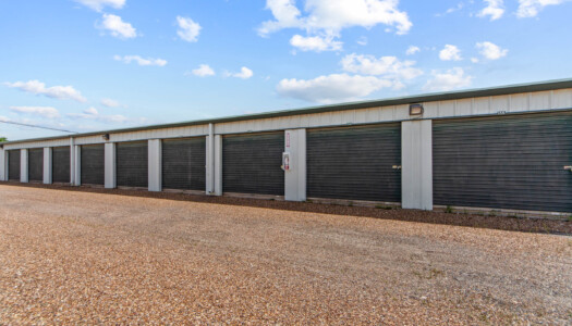 row of drive-up storage units at Storage Sense in Haslet, TX