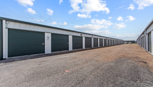 row of drive-up storage units at Storage Sense in Haslet, TX