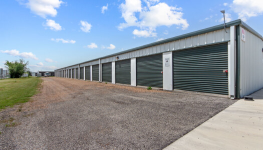 row of drive-up storage units at Storage Sense in Haslet, TX