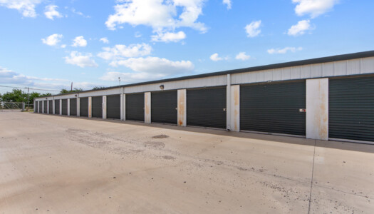 row of drive-up storage units at Storage Sense in Haslet, TX