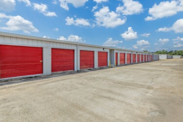 row of drive-up storage units at Storage Sense in Lake Charles, LA