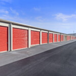 row of drive-up storage units at Storage Sense on Feagin Mill Road in Warner Robins, GA