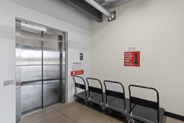 storage elevator and moving carts at Storage Sense facility in Waxahachie, TX